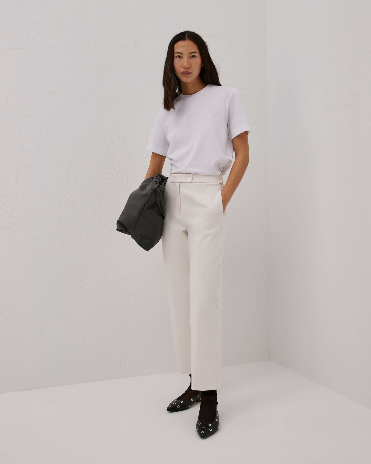pantaloni slim in punto milano