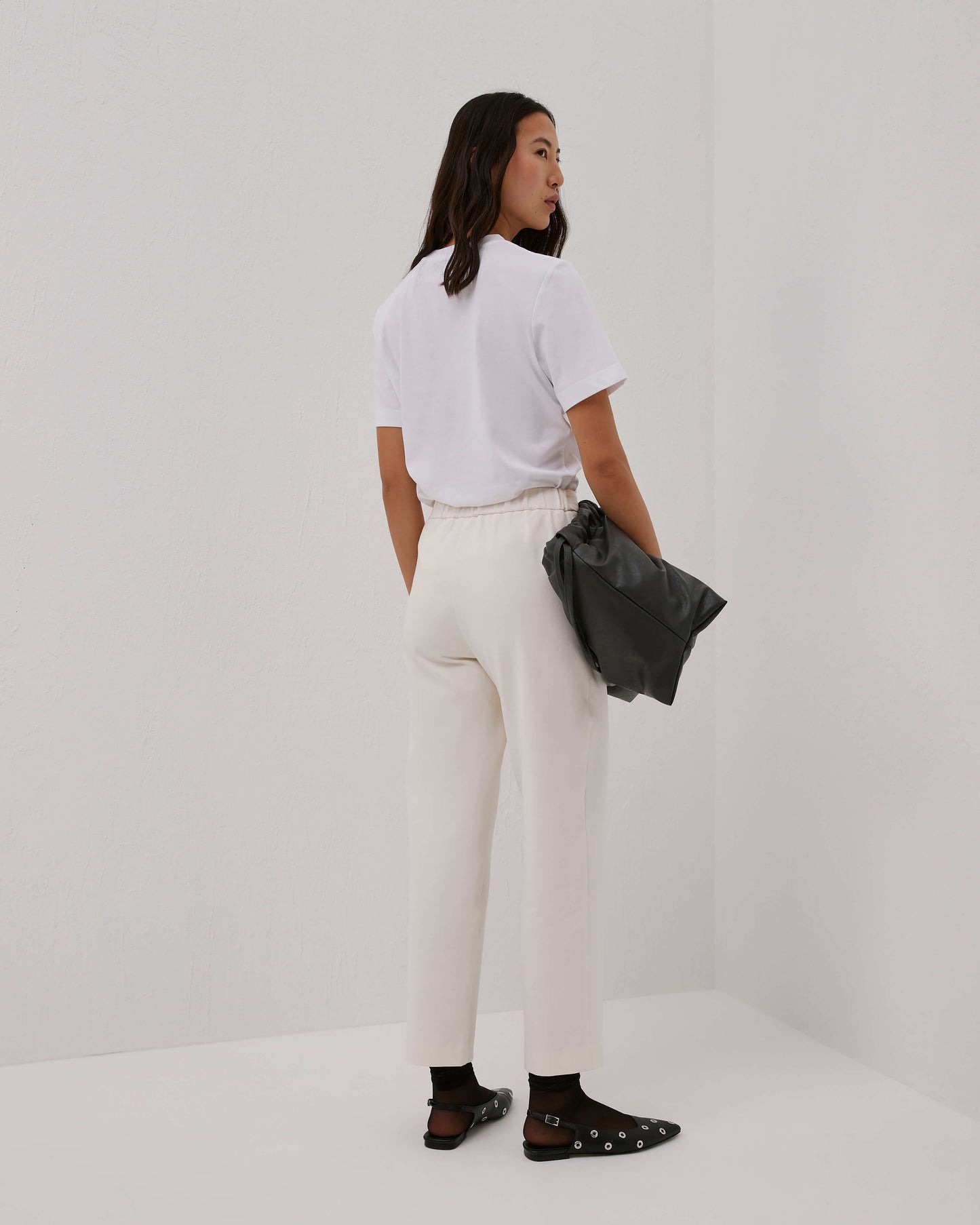 pantaloni slim in punto milano